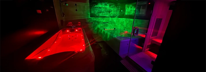 Recovery And Health Spa Doylestown PA Float Therapy Room Therapeutic Float Tanks In Dimly Lit Room