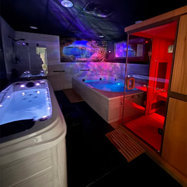 Multiple Float therapy Tanks And Infrared Sauna In Roiom With Purple Lights
